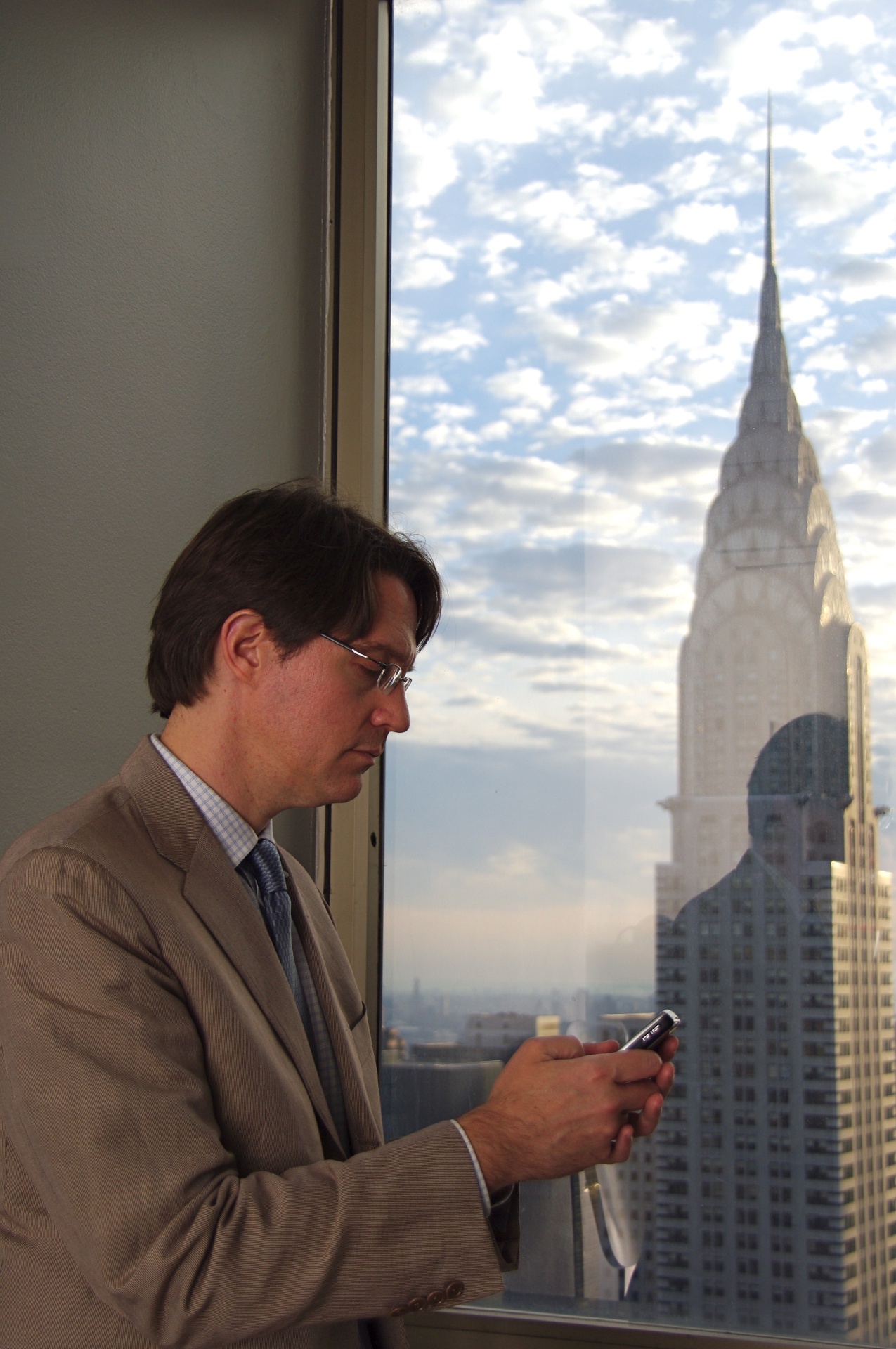 Professional working from a window-side office